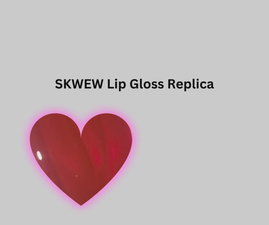 Fire Kiss Lip Gloss. The color SKWEW gives a deep luster pink glow. The lip gloss is packaged with an illuminating applicator wand that lights up when the lip gloss is applied.